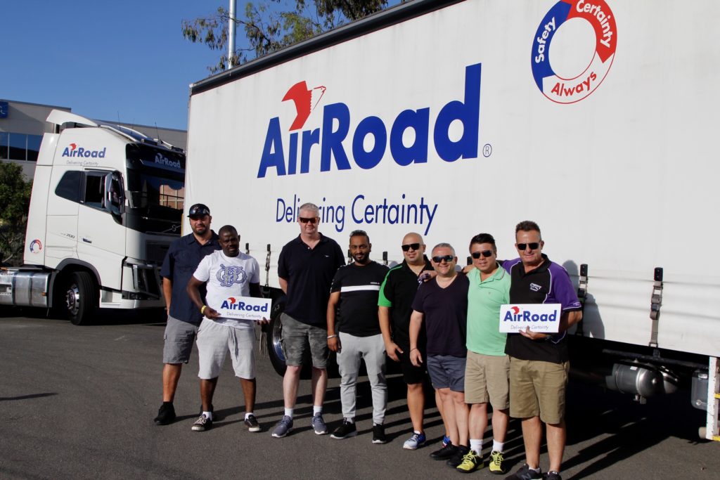 AirRoad Drivers standing in front of truck at Convoy for Kids 2019