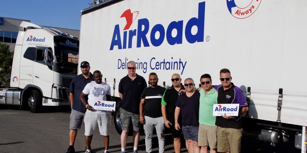 AirRoad Drivers standing in front of truck at Convoy for Kids 2019